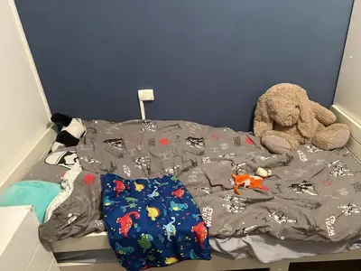 Un ou plusieurs lits dans un hébergement de l'établissement Appartement lumineux,3 chambres,proche de la gare