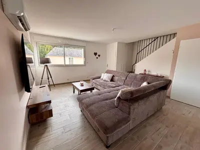Coin salon dans l'établissement Maison Rosie - Maison moderne cozy avec extérieur