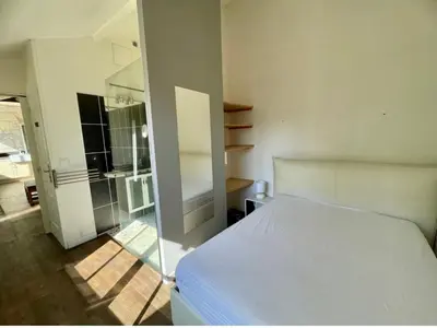 Un ou plusieurs lits dans un hébergement de l'établissement Charmante Maisonnette en Tuffeau à Deux Pas de la Loire, Saumur Centre avec Parking gratuit