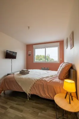 Un ou plusieurs lits dans un hébergement de l'établissement 4 Bis - Maison moderne cozy avec extérieur