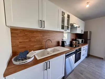 Cuisine ou kitchenette dans l'établissement Maison Mocca - Maison moderne cozy avec extérieur