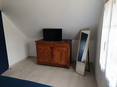 Télévision ou salle de divertissement dans l'établissement gite de la Grand Maison le Châtaigner