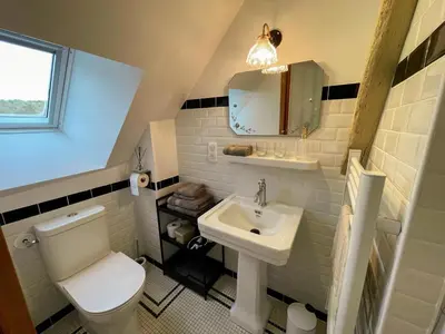 Salle de bains dans l'établissement La source de Vaugadeland