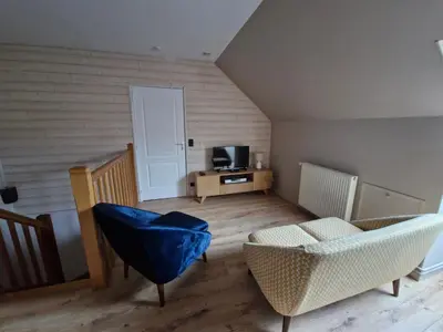 Coin salon dans l'établissement Chambre Proche Circuit 24h