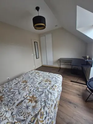 Un ou plusieurs lits dans un hébergement de l'établissement Chambre Proche Circuit 24h