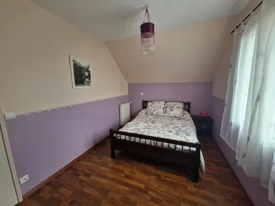 Un ou plusieurs lits dans un hébergement de l'établissement Chambre Proche Circuit 24h