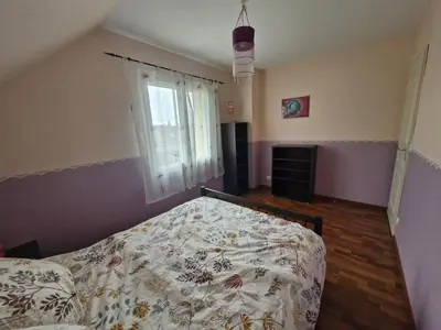 Un ou plusieurs lits dans un hébergement de l'établissement Chambre Proche Circuit 24h