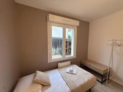 Un ou plusieurs lits dans un hébergement de l'établissement Le Pavillon des Demoiselles maison, ville 6 pers