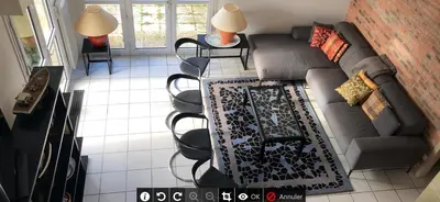 Coin salon dans l'établissement GITE L'ESCALE à FONTEVRAUD