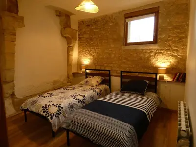 Un ou plusieurs lits dans un hébergement de l'établissement Gîte Val de Loire Le Puits