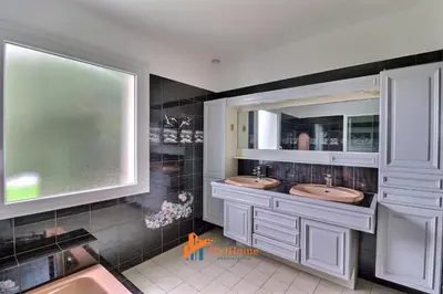 Cuisine ou kitchenette dans l'établissement La Tuilerie - Maison familiale