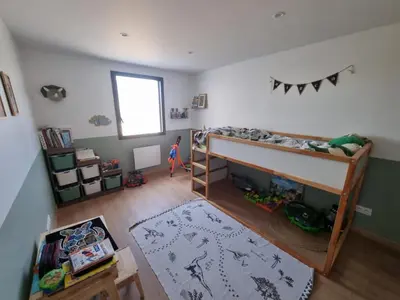 Un ou plusieurs lits dans un hébergement de l'établissement Villa tout confort avec piscine, 5 chambres, proche Loire