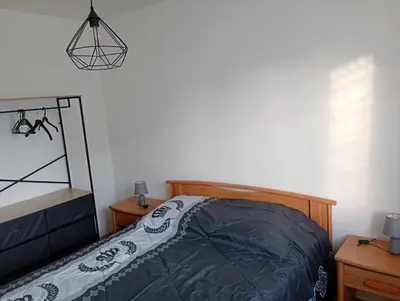 Un ou plusieurs lits dans un hébergement de l'établissement Maison Marigné Laillé