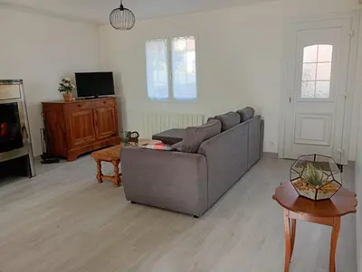 Télévision ou salle de divertissement dans l'établissement Maison Marigné Laillé