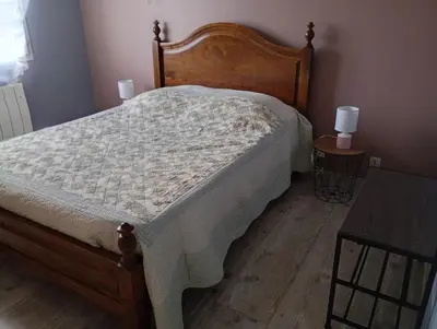 Un ou plusieurs lits dans un hébergement de l'établissement Maison Marigné Laillé