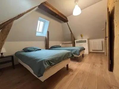 Un ou plusieurs lits dans un hébergement de l'établissement Maison de campagne idéale pour 6 personnes