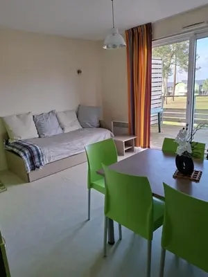 Coin salon dans l'établissement Fully equipped Poussin 12 cottage