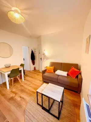 Coin salon dans l'établissement Appartement au calme, coeur de ville