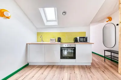 Cuisine ou kitchenette dans l'établissement Le Logis - 6 prs - Hyper
