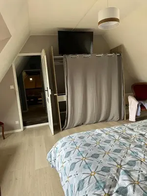 Un ou plusieurs lits dans un hébergement de l'établissement Maison de campagne