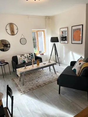 Coin salon dans l'établissement Sunshine cottages
