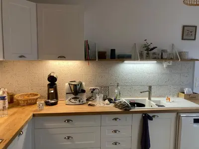 Cuisine ou kitchenette dans l'établissement Chambre à louer 24h Le Mans