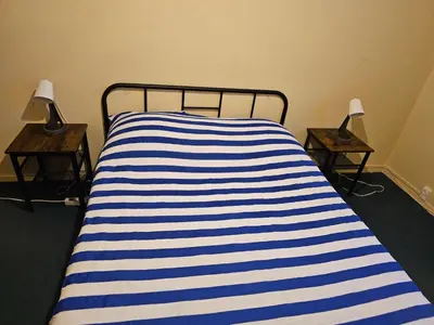 Un ou plusieurs lits dans un hébergement de l'établissement Charming 3-Bedroom Apartment in Saint-Pierre-des-Corps