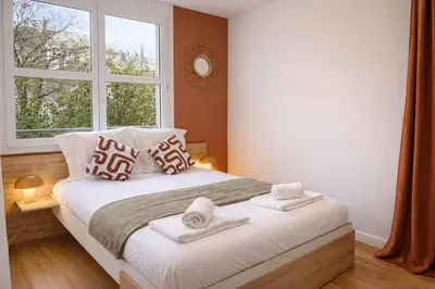 Un ou plusieurs lits dans un hébergement de l'établissement Appartement hyper Centre Rénové Terrasse & Parking
