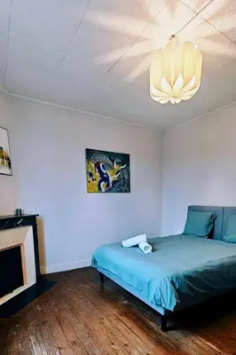 Un ou plusieurs lits dans un hébergement de l'établissement La Maison d Yvré charme et calme près du Mans