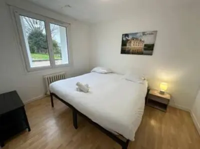 Un ou plusieurs lits dans un hébergement de l'établissement Appartement avec terrasse au centre de St Cyr
