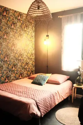 Un ou plusieurs lits dans un hébergement de l'établissement Location chambre 24H du Mans
