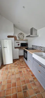 Cuisine ou kitchenette dans l'établissement Gite la Berlotte