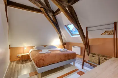 Un ou plusieurs lits dans un hébergement de l'établissement Magnifique loft au pied du tram - Wifi - Bureau