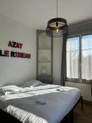 Un ou plusieurs lits dans un hébergement de l'établissement Studio avec vue sur le Château