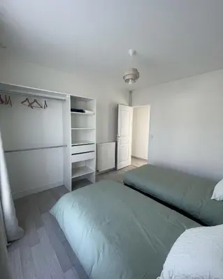 Un ou plusieurs lits dans un hébergement de l'établissement Maison spacieuse & lumineuse à Châtellerault