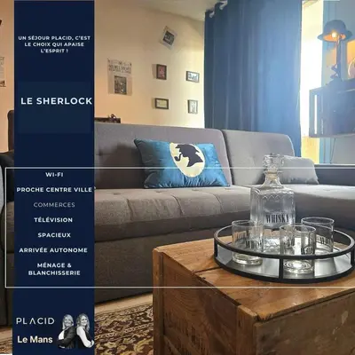 Coin salon dans l'établissement Le Sherlock 2 - balcon - original - Wifi