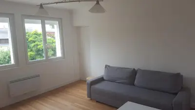 Coin salon dans l'établissement Maison avec jardin et garage