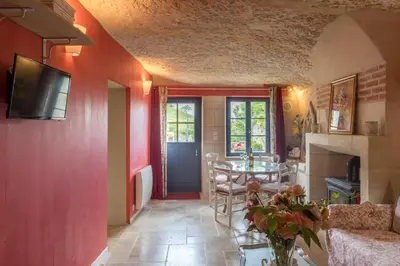 Télévision ou salle de divertissement dans l'établissement Gîte De La Rochère