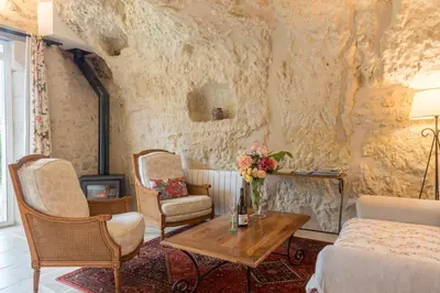 Coin salon dans l'établissement Gîte De La Rochère