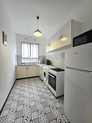 Cuisine ou kitchenette dans l'établissement Le Matisse 2 - centre-ville - Wifi - spacieux