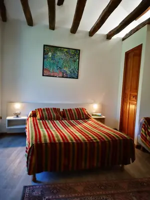 Un ou plusieurs lits dans un hébergement de l'établissement Guest House La Fauvelaie
