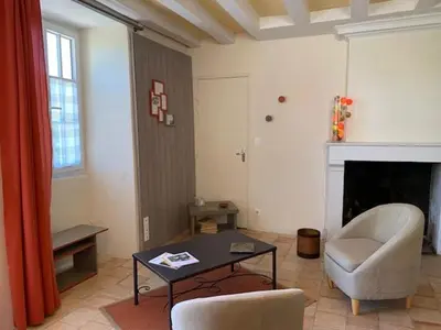 Coin salon dans l'établissement LA PONCÉ SECRÈTE