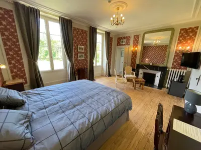 Un ou plusieurs lits dans un hébergement de l'établissement Château De La Coutancière