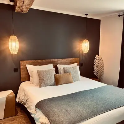Un ou plusieurs lits dans un hébergement de l'établissement Hôtel Rive Sud