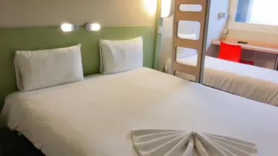 Un ou plusieurs lits dans un hébergement de l'établissement ibis budget Tours Centre Gare et congrès