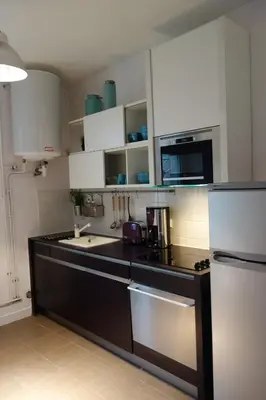 Cuisine ou kitchenette dans l'établissement La Garzette
