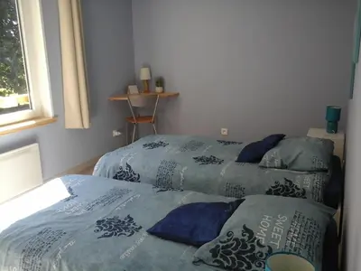 Un ou plusieurs lits dans un hébergement de l'établissement Gîte de la Rotterie