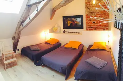 Un ou plusieurs lits dans un hébergement de l'établissement Maison 1440 - SPIRIT, logement Atypique Sport Auto