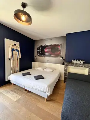 Un ou plusieurs lits dans un hébergement de l'établissement Maison 1440 - SPIRIT, logement Atypique Sport Auto