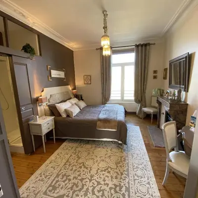 Un ou plusieurs lits dans un hébergement de l'établissement Les Lamartine-chambres d'hôtes
